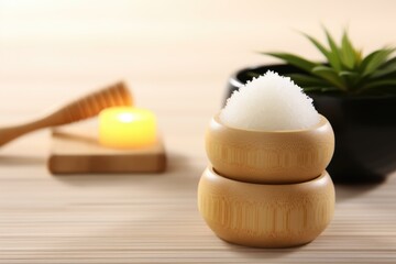 dry massage brush next to a pot of coconut oil