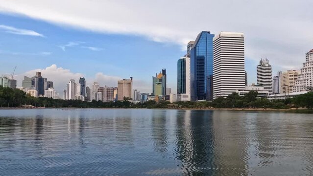 Beautiful 4K Timelapse Reverse Shot of Lake Ratchada at Benjakitti Park, Bangkok Thailand.