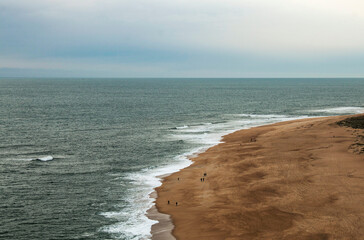 View of the Atlantic Ocean from cliffs in Nazaré, Portugal - 663768890