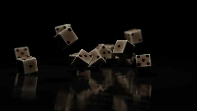 Dice cubes falling on a wooden table against a dark background