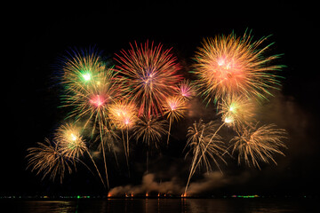 Real Fireworks at Pattaya bay, Pattaya national Fireworks Festival contest, November of every Year, Beautiful of bright light fireworks Show in middle sea, for postcard wallpaper background,