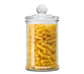 Glass jar filled with dry rotini pasta isolated on white