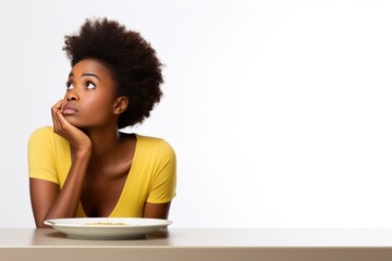A woman pondering a plate of food. Fictional characters created by Generated AI. - obrazy, fototapety, plakaty