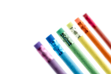 Set of  Colored Pencils Made by Recycled Paper with colored erasers arranged on white background. Environmentally friendly stationary supplies