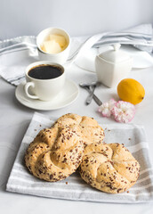Breakfast with fresh rolls and coffee. on a white background. Morning