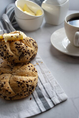 Breakfast with fresh rolls and coffee. on a white background. Morning