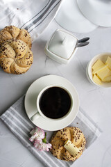 Breakfast with fresh rolls and coffee. on a white background. Morning