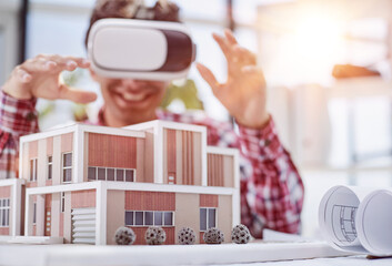 Virtual reality futuristic design technology. Architect or design engineer in VR headset for BIM...