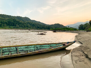 wooden boat on the river