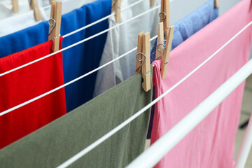 Naklejka premium Clothes are dried on the dryer after washing