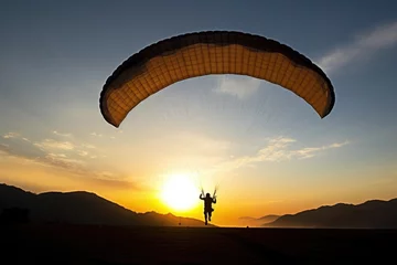 Deurstickers paraglider silhouette taking off at sunrise © Alfazet Chronicles