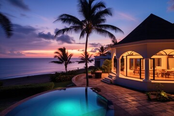 twilight view of a vacation villa overlooking the ocean