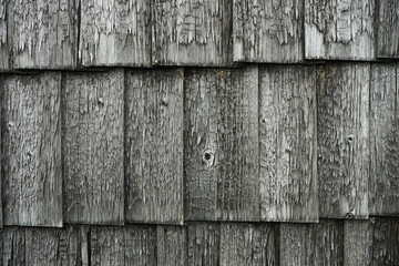 Gray wooden wall close up