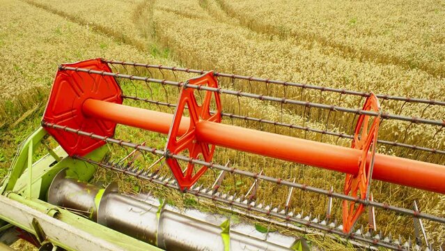 A close-up of the harvester that works even when the harvester turns around. The technique processes the field according to a certain technology. High quality 4k footage