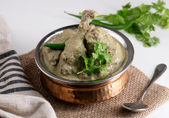 Delicious creamy green chicken curry made up of green spices and herbs