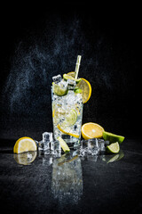 drink with ice, lemon and lime