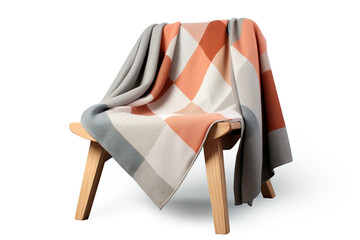 A cozy, woven throw blanket with a modern geometric pattern, folded neatly and resting on a sleek wooden bench, evoking warmth and comfort. Isolated on a White Background