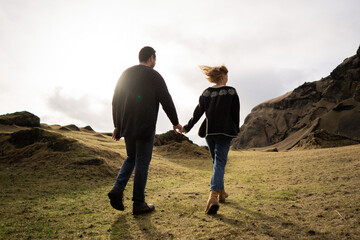 Couple in love against the background of mountains