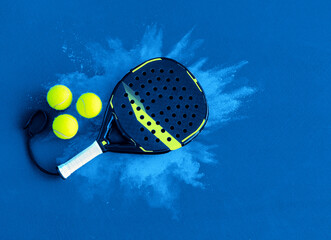 Padel tennis racket. Background with copy space. Sport court and balls. - 663837215