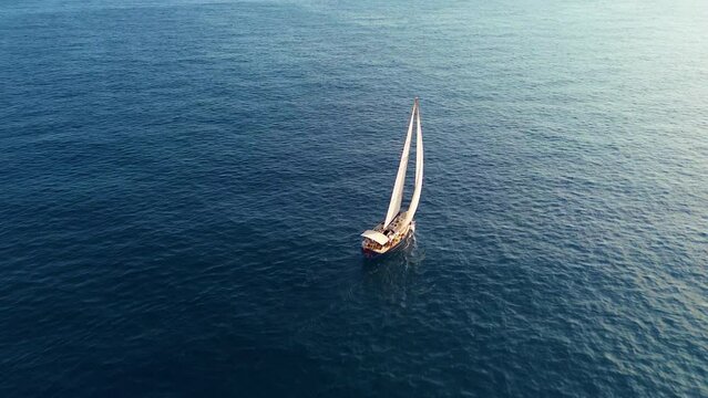 An Old Sailing Boat Is Visible In This Aerial View Of The Ligurian Sea.