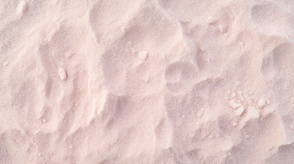 Obraz premium Top view of pink sand, captured in close-up detail, displaying textured grains.