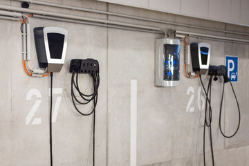 Car Charging Station, e-car Charge Point or Electric Vehicle Supply Equipment (EVSE) in Underground...