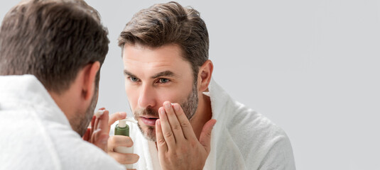 Cosmetic cream for man. Spa male model, skincare product for skin face. Morning mask for skin with anti-aging effect. Skin care. Male face cream. Man with perfect soft skin. Beauty cosmetic banner.