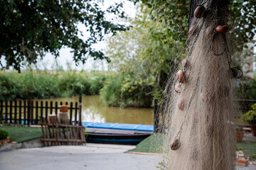 old fishing net drying in the sun, fishing tools