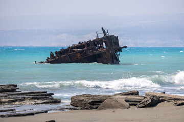 Akrotiri Shipwreck on turquoise rocky shore on Mediterranean Coast Aglantzia, Cyprus. - 663857497