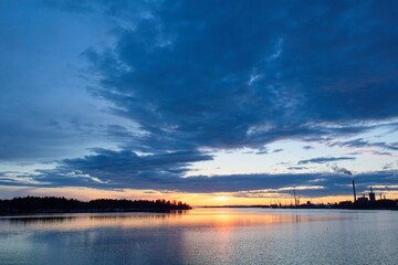 Fototapeta na wymiar Cloudy sunset in spring, Vaasa, Finland.