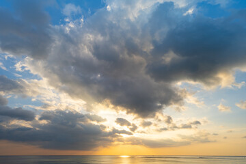 Landscape colorful clouds in the sky sunset or sunrise over sea with reflection in the tropical sea,Beautiful landscape scenery,Amazing light of nature, Landscape nature background