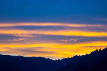 Landscape colorful clouds in the sky sunset or sunrise over sea with reflection in the tropical sea,Beautiful landscape scenery,Amazing light of nature, Landscape nature background