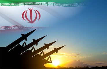 Missiles silhouette with Iran flag against the sunset. Iran nuclear missile launch
