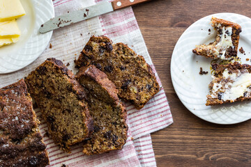 Homemade chocolate chip roasted banana bread served with butter.