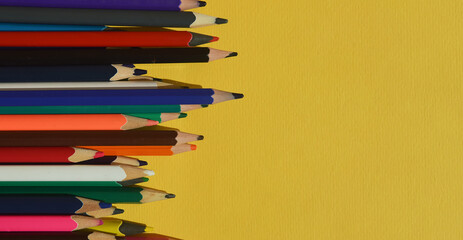 colored pencils for drawing. stationery for school. background for the design