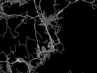 Vector road map of the city of  Tamano in Japan with white roads on a black background.