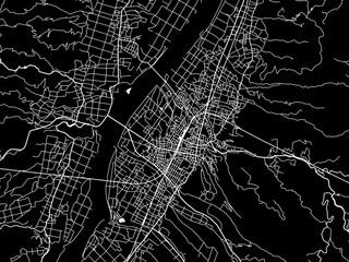 Vector road map of the city of  Tokamachi in Japan with white roads on a black background.