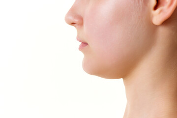 Close-up cropped profile portrait of good-looking woman nose, neck, chin. Beauty anti-aging...