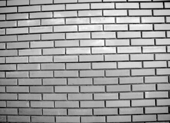 Obraz premium Brick wall texture. House wall pattern black and white photo, close view