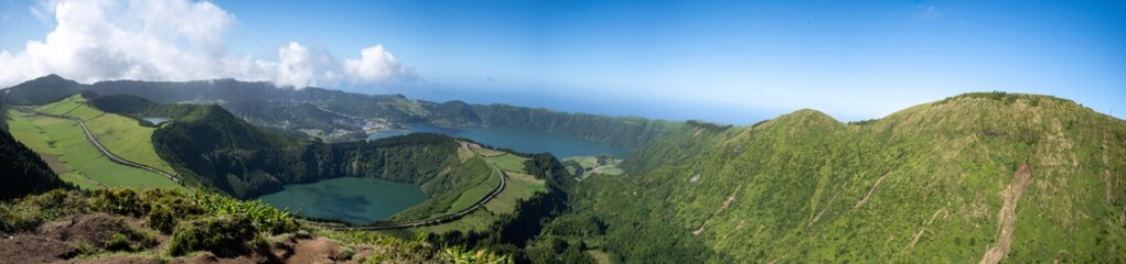 Panoramic view of craters, lakes and town from Boca do Inferno viewpoint on Sao Miguel island,...