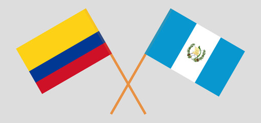 Crossed flags of Colombia and Guatemala. Official colors. Correct proportion