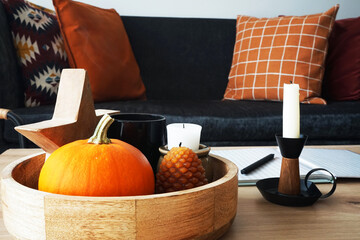 Candles and various autumn decor in a modern interior