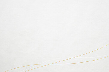 Elegant and modern patterned Japanese washi paper background. Japanese washi paper texture with golden abstract wave patterns.