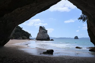 Tuinposter Big cave on the beach © Nicolas