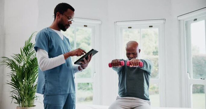 Senior man, physiotherapist and tablet for healthcare, dumbbell exercise and stretching test in physical therapy. Nurse, doctor and elderly person in consultation with muscle health and digital app