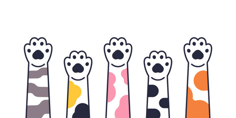 Cute colored paws of cats in flat simple style. Illustration of cute paws of cats in different colors