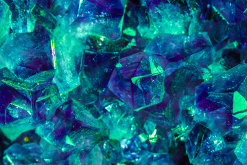 Fototapeta na wymiar Aquamarine crystal mineral stone. Gems. Mineral crystals in the natural environment. Texture of precious and semiprecious stones. shiny surface of precious stone