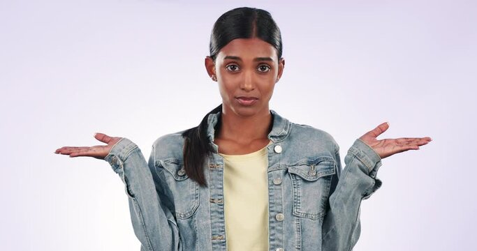 Confused, palm or face of woman with choice or decision in studio on white background for question. Doubt, portrait or gen z Indian person shrugging at option, marketing offer or sale on mockup space