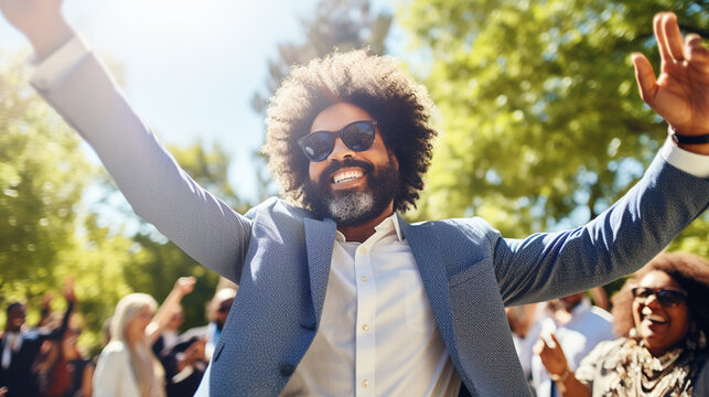 a man with a big smile on his face, wearing a blue suit and sunglasses. a joyful and celebratory mood, dancing or jumping in the aircitement.