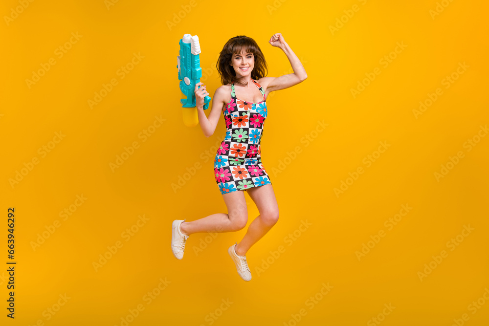 Sticker full length photo of carefree lucky woman dressed flower print outfit jumping high winning water bat